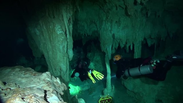 Cave divers enter the system