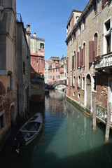 Fototapeta na wymiar Fondamenta Folzi With The Narrow Canals In Venice. Travel, holidays, architecture. March 29, 2015. Venice, Veneto region, Italy.