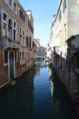 Fototapeta na wymiar Fondamenta Folzi With The Narrow Canals In Venice. Travel, holidays, architecture. March 29, 2015. Venice, Veneto region, Italy.