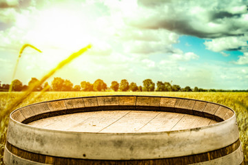 Old wooden barrel on a hot day in the cereal    