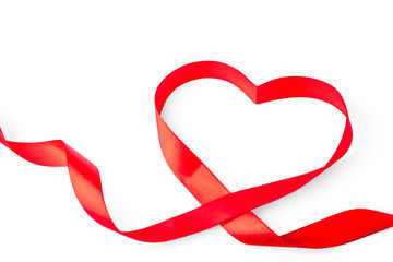 Heart shape of red ribbon isolated on white background. 