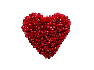 Fototapeta na wymiar Heart shaped pomegranate seeds