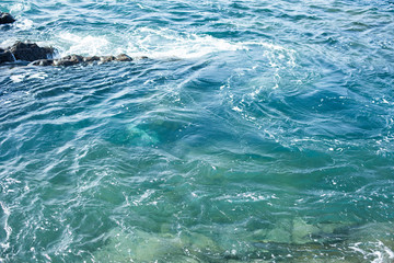 Waves splashing against the rocks. Lanzarote island.