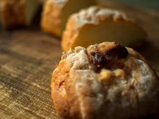 Ciabatta. homemade italian ciabatta bread top view. Bread with cheese. Sliced fresh bread on a wooden tray.