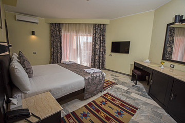 Double bed in a luxury suite of a hotel room