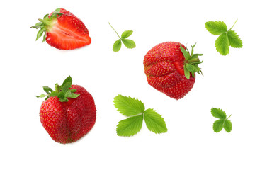 Strawberry with green leaf and slices isolated on white background. Healthy food. top view