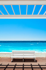White bench on the Promenade des Anglais in Nice, France.