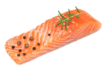 Red fish. Raw salmon fillet with rosemary isolate on white background.