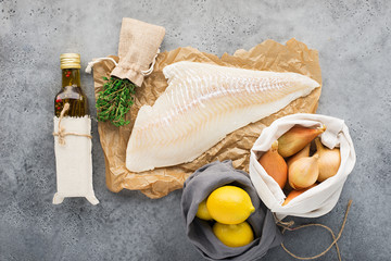 Zero waste kitchen. Ingredients of healthy nutrition. White sea fish cod fillet, shallot onions,...