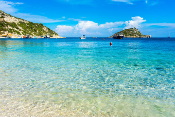 Greece, Zakynthos, Perfect sand beach and turquoise water at agios nikolaos harbor