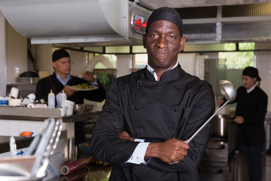 Confident African American chef