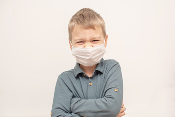 child in a medical mask. concept of an epidemic, influenza, protection from disease.