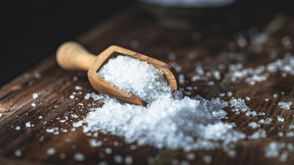 sea salt on a dark wooden background