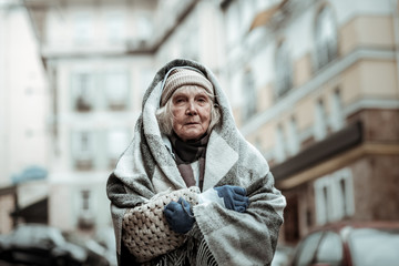 Depressed aged woman having a difficult life