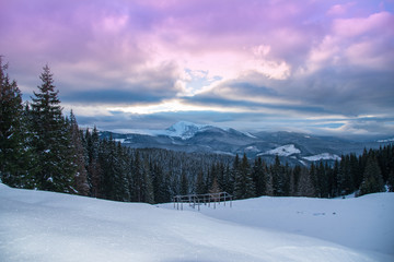 Fototapeta na wymiar Beautiful winter panoramic view snow capped mountains