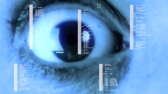A big wide open female eye with makeup, looking at the viewer with an astonished nervous expression, while computer source code scrolls in front of it. Blue tones.
