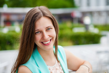 Portrait of beautiful young happy woman