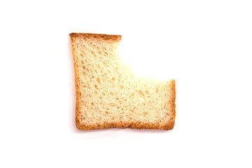 one piece of white toast bread bitten on white background