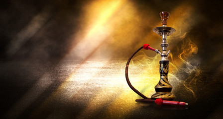 Hookah smoking on a background of abstract futuristic background, neon light, smoke.