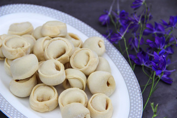 Dumplings on white plate