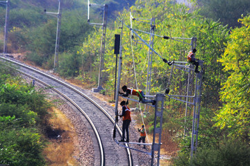 men at work on railway track