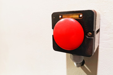 Red button. Big red button on wall. The Production emergency button pushing. Red emergency shutdown...