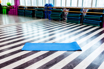 Gym with yoga mat interior