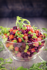 Traditional vegetarian Russian salad snack vinaigrette in a rustic recipe-.Beet Salad.