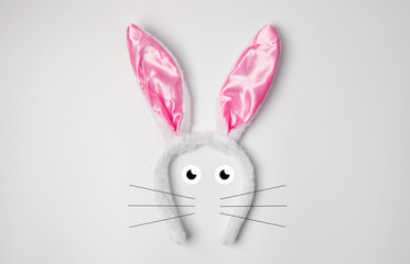 Top view of grey rabbit ears on white background easter minimal blogger concept ad sale