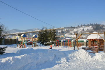 houses in the mountains in winter