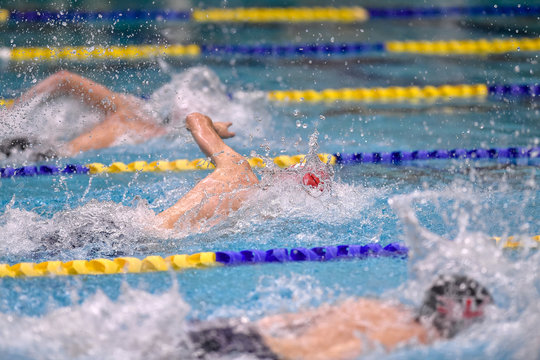 High School Swimmers competing at a swim meet in South Texas