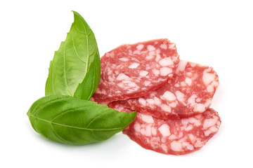 Dried salami slices, close-up, isolated on white background