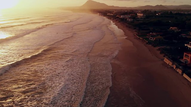 Areal view from the drone of Spain sea and the beach in the morning