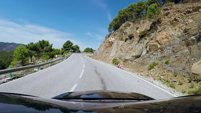 Shooting from moving car, on road in Spain