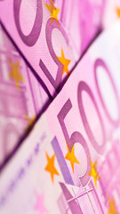 500 euro banknotes background. Popular for smuggling, contraband, corruption, illegal. Vertical.