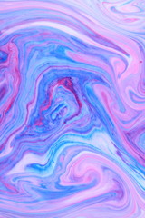 Abstract multicolored background. Fluid art of pink blue. Blue pink texture. Colored paint stains in liquid