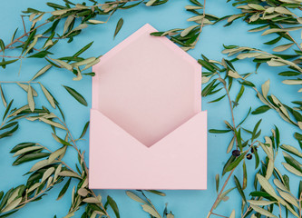 Pink envelope and olive branches