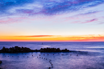 Fototapeta premium Seascape at sunset in Liguria, Italy