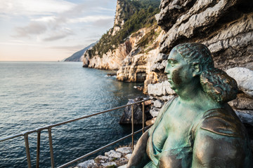 Fototapeta na wymiar Porto Venere, Italy - December 31, 2018: Statue of Mater Naturae by sculptor Scorzelli (1921-1997) in Porto Venere, Liguria