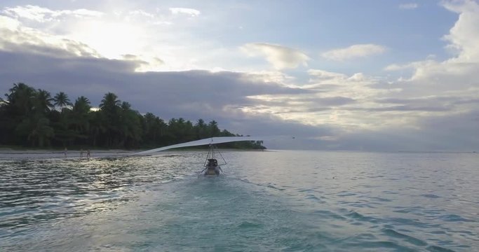 FIB - Flying Inflatable Boat. Aerial shot Towards the Amphibious Aircraft Sailing in the Caribbean Sea Before Taking Off