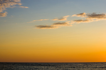 Amazing sea sunset, the sun, waves, clouds