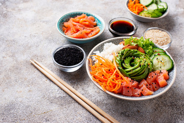 Hawaiian poke bowl with salmon, rice and vegetable