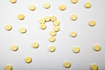 tablets question mark white background 