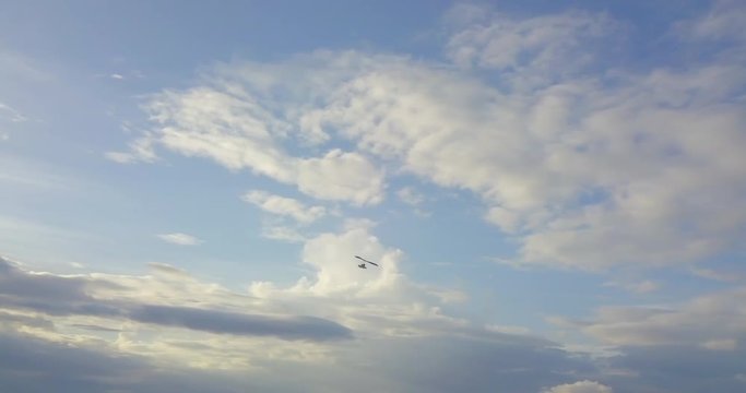 FIB - Flying Inflatable Boat. Aerial shot following the amphibious aircraft flying in the sky.