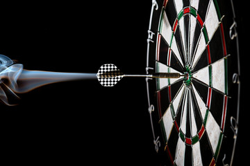 Dartboard. dart in bullseye.