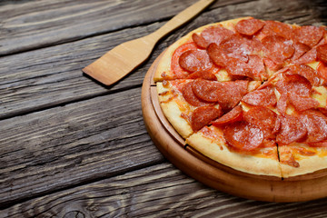  Homemade pizza on a wooden table