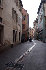 Plakat narrow street in old town