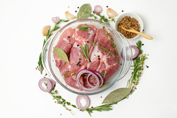  Fresh meat and spices on a white background. Cooking concept.