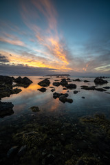 Fototapeta na wymiar Sunset on the Wellington coast in New Zealand