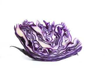 Obraz premium slice of red cabbage with a beautiful texture isolated on a white background, close up, copy space